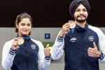 Manu Bhaker bronze medals, Manu Bhaker news, manu bhaker makes olympics history for india with second bronze, P v sindhu