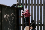 punjabi women, punjabis crossing US mexico border, video clip shows punjabi women children crossing border fence into u s, Punjabis