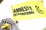India, India, amnesty international halts work in india, Modi government