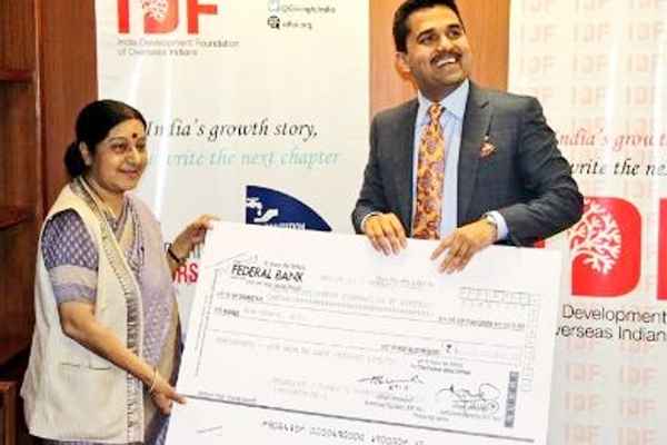 NRI gives Sushma Swaraj Rs 1 crore cheque for a cleaner India!
